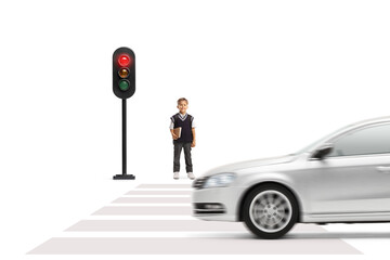 Sticker - Schoolboy in a uniform holding a book and waiting at pedestrian crossing