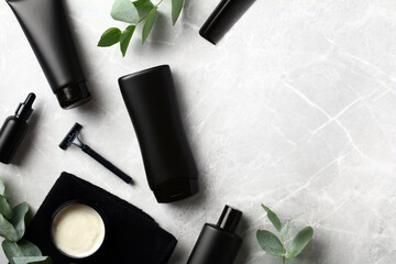 Wall Mural - flat lay composition with shaving accessories and bathroom cosmetics for men on marble background.