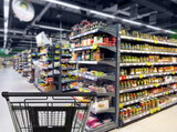 Fototapeta  - Choosing food from shelf in supermarket,vegetables in grocery section,Grocery stores