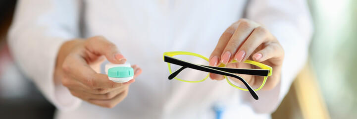 Sticker - Woman doctor holding glasses and contact lens case