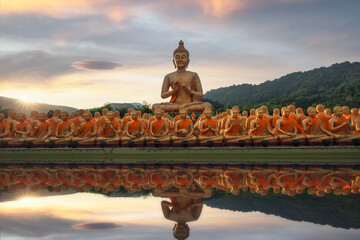 Big golden Buddha statue among small 1,250 Buddha statue at Makha Bucha Buddhist memorial park at nakhon nayok province, Thailand