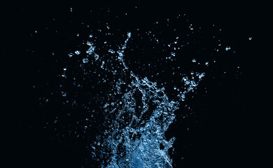  Water splash movement pattern. Water splash on black background.