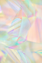 Blurred Closeup Of Ethereal Pastel Neon Cream, Pink, Mint, Yellow, Purple, Lavender Holographic Metallic Foil Background. Abstract Modern Surreal Futuristic Disco, Rave, Festive Dreamlike Backdrop