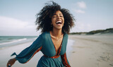 Fototapeta Miasto - Happy laughing black woman on beach smiling laughing on summer holiday vacation travel lifestyle freedom fun made with AI