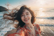 beautiful asian girl laughing on the beach, taking selfie enjoying vacation and summer. liberated concept. ai generated illustration