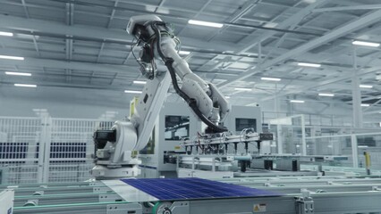 Wall Mural - Automated Solar Panel Production Line. White Industrial Robot Arm Assembles Solar Panel, Placing PV Cells. Modern, Bright Manufacturing Facility.