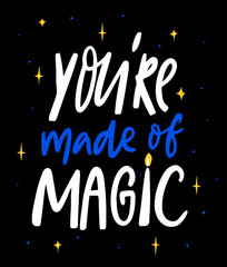 Wall Mural - You are made of magic. Inspirational witchy quote, hand lettering on black background decorated with magic elements.