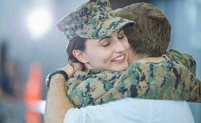 Wall Mural - Husband greeting hugging soldier wife