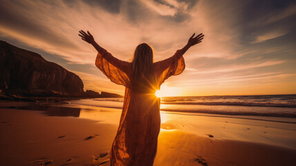 Woman on the beach worshiping the Sun at sunset with dramatic light