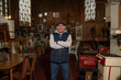 © Connect Images - Portrait of senior worker in furniture shop