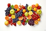 Fototapeta Tęcza - Colorful fruits, including oranges, apples, grapes, and berries, arranged neatly on a clean white background, perfect for promoting healthy eating and a balanced lifestyle. Generative Ai