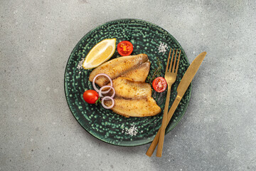 Canvas Print - Baked white fish fillet tilapia or pangasius. Long banner format. top view