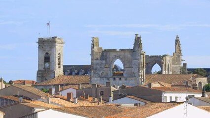 Wall Mural - Tower and old transept of the Saint Martin church in Saint-Martin-de-Ré, France