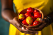 Captivating African woman's hands presenting a dish of fresh ackee, an enticing Caribbean cuisine ingredient with emotional allure. Taste the culture! Generative AI