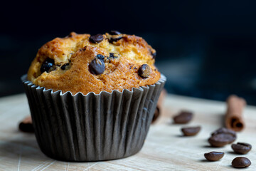 Cupcake with chocolate pieces, close up