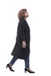© ASDF - in full growth. confident mature woman taking a step forward.