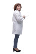 © ASDF - side view. female doctor using a digital tablet