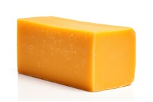 Block Of Aged Cheddar Cheese, Noted For Its Sharp, Tangy Flavor And Firm Texture
