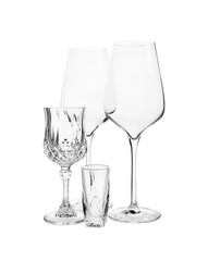 Wall Mural - Different elegant empty glasses isolated on white