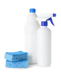 Bottles of detergent and blue cleaning sponges on white background