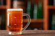 © Pixel-Shot - Mug of beer on table in bar. Oktoberfest celebration