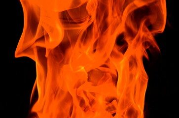 Poster - The graphic resource consists of a thick pillar of fire on a black background.
