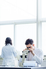 Poster - Multinational researcher group experimenting in the lab. Research and Development.