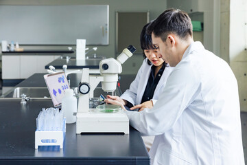 Poster - Multinational researcher group experimenting in the lab. Research and Development.
