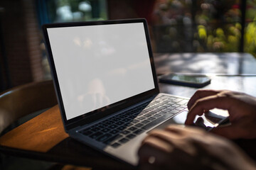 Laptop with blank screen on table. Workspace background new project on laptop computer with blank copy space screen for your advertising text message