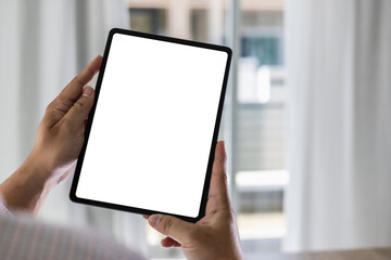 Poster - man hand holding digital tablet touch white screen device isolated screen ONLINE ADVERTISING communication empty space frame mockup, internet touchpad touchscreen information ipad.