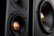 © Lazy_Bear - Multimedia acoustic sound speakers. Sound audio system on dark background. Stereo system for listening music