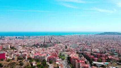 Wall Mural - Aerial cityscape view of Barcelona and the sea on a sunny day during summer in Barcelona Spain