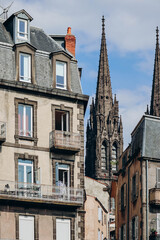 Canvas Print - Fragment of the facade of an old building in the center of Clermont Ferrand, France