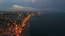 Aerial Cityscape View Of Barcelona Coastline During A Clear Summer Night In Barcelona Spain