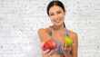 © Art_Photo - Portrait of beauty body slim healthy asian woman big smile with vegan food healthy holding apple, green apple, dental, teeth, fruit on wall.Diet.Fitness, healthy food
