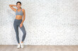 © Art_Photo - Portrait of sport slim strength woman training in sportswear sit relax, practicing yoga, fitness, exercise, wellness, workout, sport with blue fitball at home.Diet concept.Fitness, healthy lifestyle