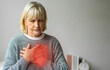 Senior adult elderly woman with chest pain suffering from heart attack, health and medical, heart health,  heart attack, world heart day, cardiovascular disease.insurance and hospital concept