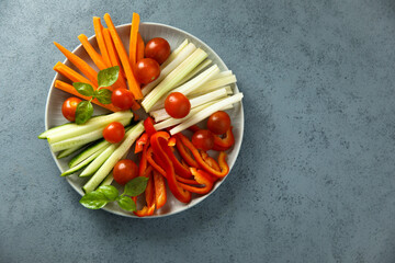 Raw vegetable platter with fresh basil