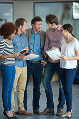 Canvas Print - Team planning, talking or business people with ideas in meeting for brainstorming together in office. Diversity, digital or IT employees networking with technology, notes or documents in workplace