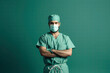 Portrait of young male medical staff in green uniform on green background. AI Generative