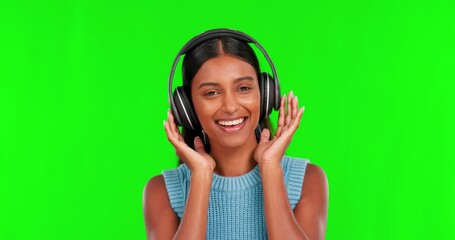 Poster - Happy woman, headphones and dancing to music on green screen against a studio background. Portrait of female person smile with headset listening for audio streaming, songs or sound track on mockup