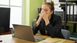 © Krakenimages.com - Young beautiful hispanic woman business worker stressed using laptop at office