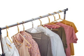 second-hand clothes on the rail on a light background. the concept of sustainable economic life.