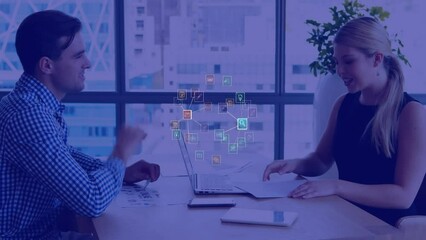 Poster - Animation of globe of digital icons spinning against diverse man and woman shaking hands at office
