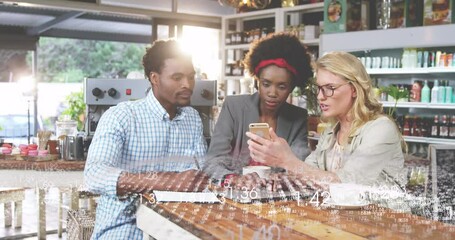 Wall Mural - Animation of wave of changing numbers over diverse coworkers sharing ideas in cafes