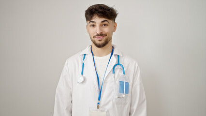 Wall Mural - Young arab man doctor smiling confident standing over isolated white background