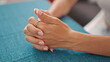 © Krakenimages.com - Young beautiful hispanic woman sitting on table with hands together at dinning room