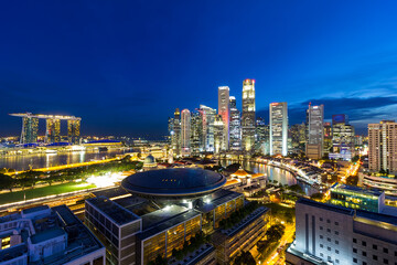 Sticker - Singapore Central Business District and Marina Bay along Singapore River during evening twilight blue hour