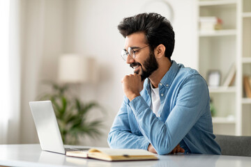 Aufkleber - Portrait Of Smiling Handsome Indian Man Working With Laptop At Home Office