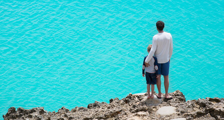 Poster - panorama of father and son enjoying beautiful anguilla island at caribbean